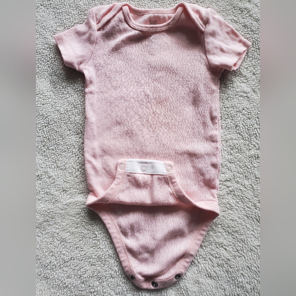 Pale pink onesie